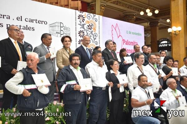 Palacio Postal inaugura nueva salas de Exosición
En el marco del Día del Cartero, este 11 de noviembre, Violeta Abreu González directora del Servicio Postal Mexicana, otorgo reconocimiento  a carteros y personal del Servicio Postal Mexicano por su trayectoria por más de 30, 35 y 40 años de servicio para el servicio postal mexicano



ext and Photo by: Yanín Ramírez
Keywords: palacio postal correos de mexico carteros dia del cartero